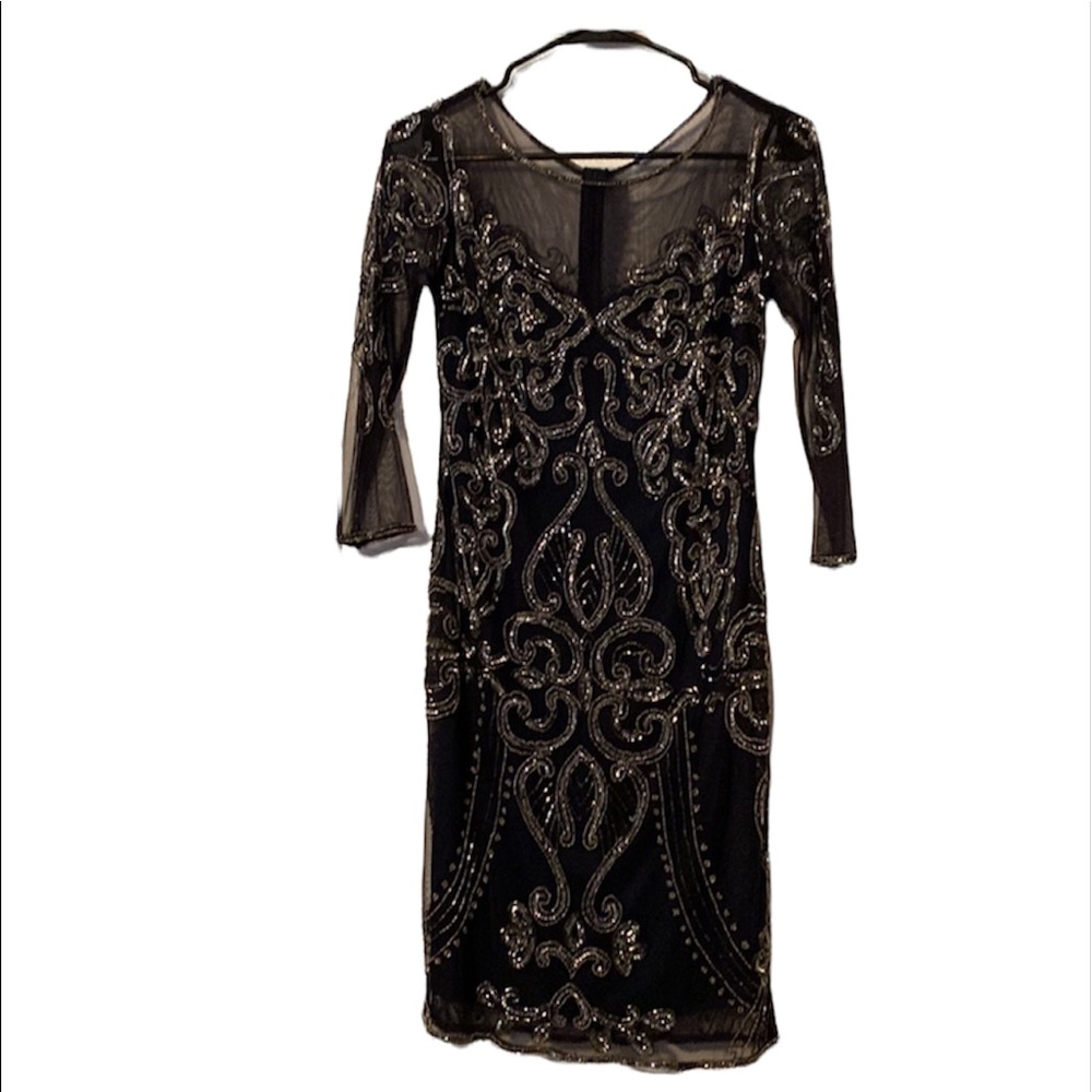 Navy blue sheer mid length silver bugle beaded top to bottom front to back.